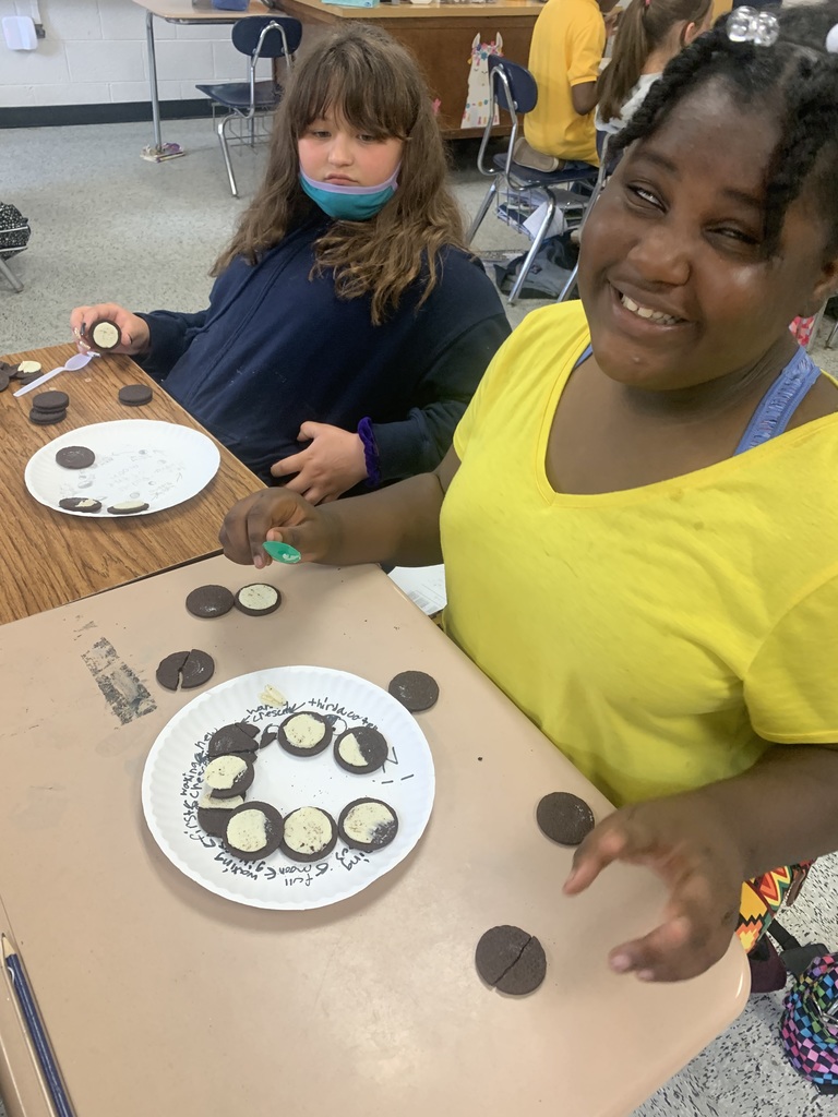 Ms. Kelley's class is all smiles while creating representations of the phases of the moon. 
