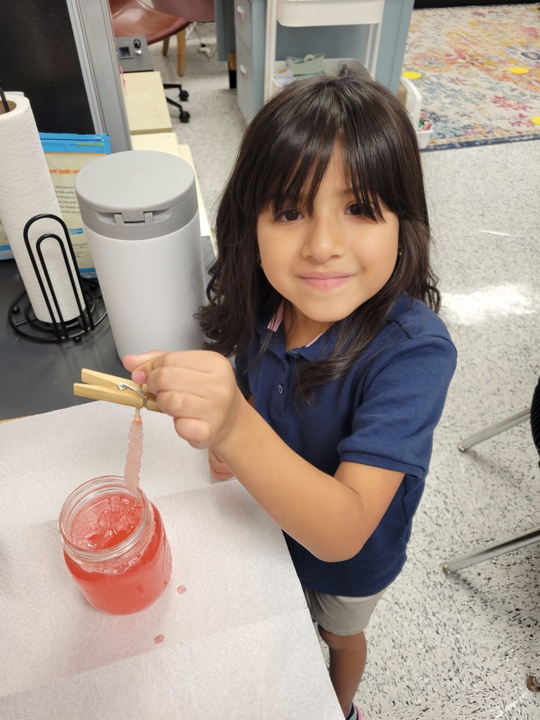 Student showing her rock candy.