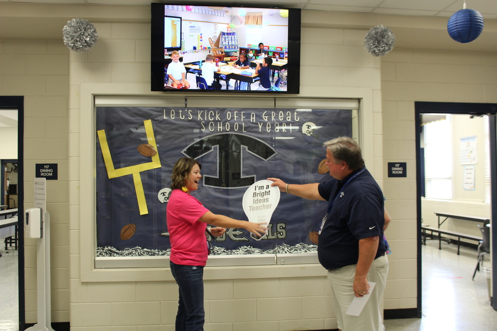 Mrs. Lasseter receiving her grant.