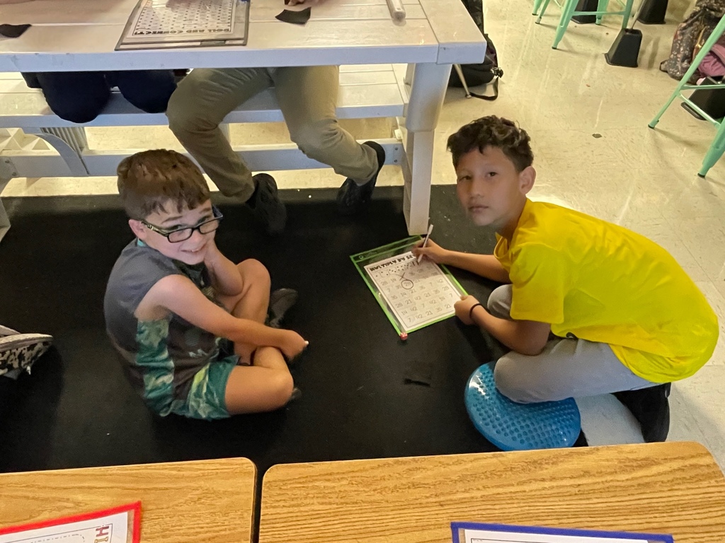 Students playing math games.